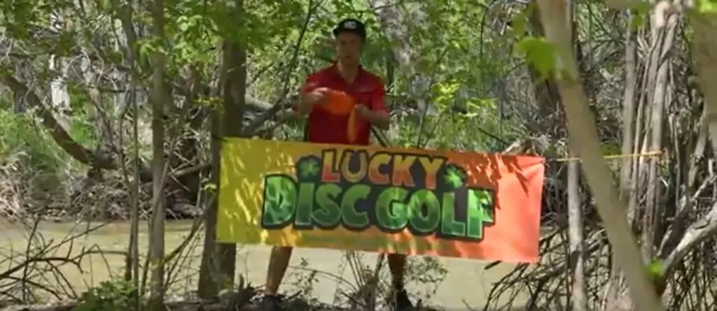 Ricky Wysocki Putthing through the Lucky Open Disc Golf Course